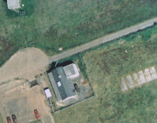 Ventnor top site bungalow and water tower. This photo was taken an unknown time after the RAF had departed.