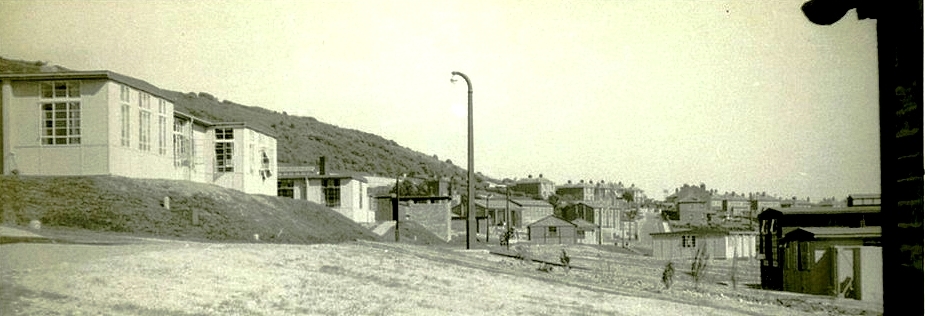 View towards the main gate, showing Cookhouse on the left and Sick Quarters on the right. Photo provided by Roy Eames